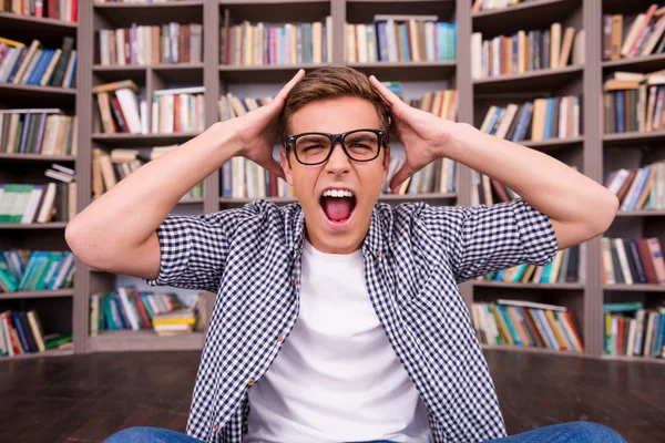 Shocked young man shouting