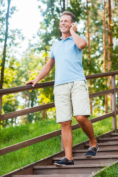 Mature man talking on the mobile phone