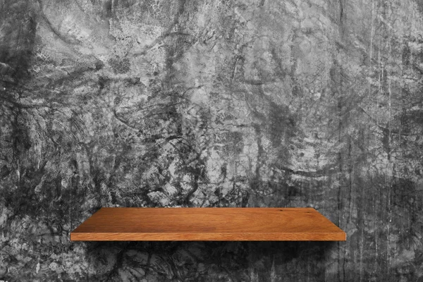 Wood shelf on cement wall