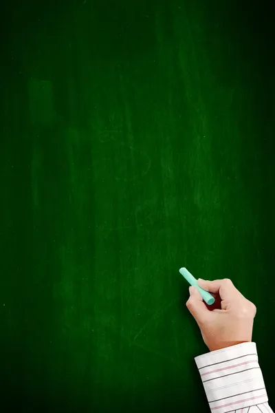 Hand writing on blackboard