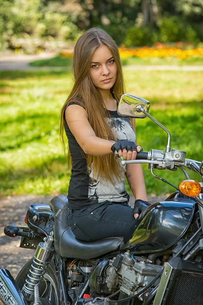 Young girl a motorbike
