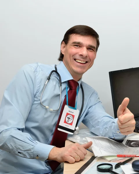 Doctor rejoices the successful healing of the patient