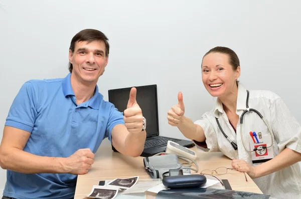 Doctor and patient are happy successful treatment the sick