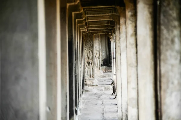The beautiful of carved stone pillars that surrounds the inner wall of Angkor Temple