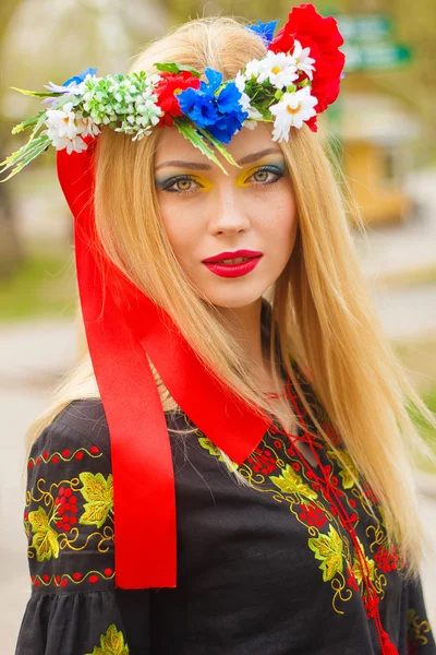 Beautiful girl in Ukrainian national dress posing