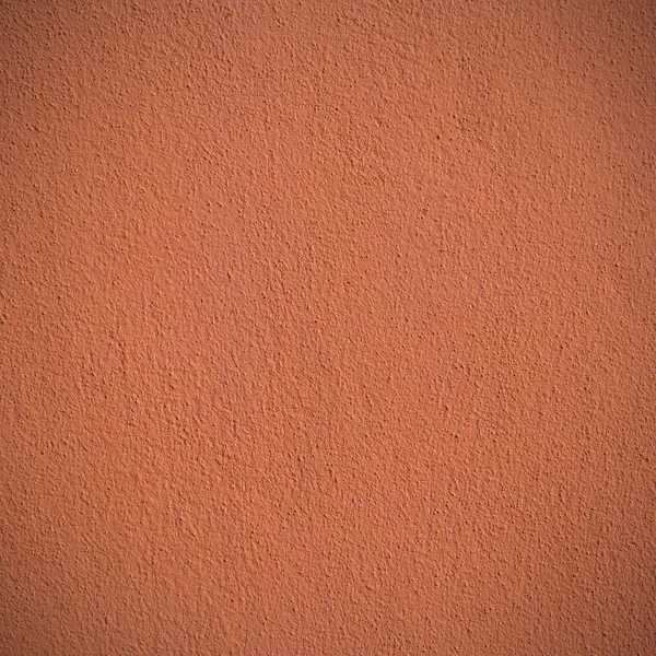 Orange paint concrete wall background or texture