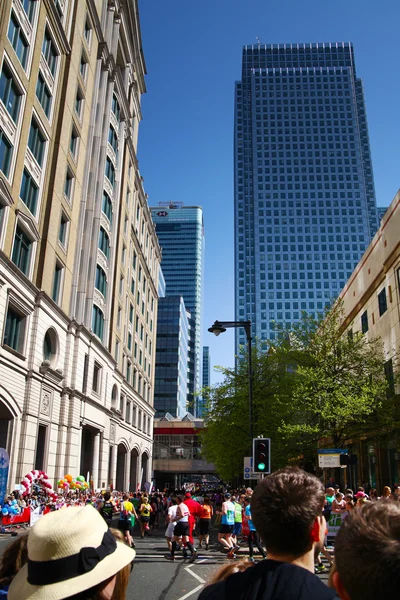 LONDON, UK - APRIL 13, 2014 - London Marathon in Canary Wharf aria, massive sport event, Supportive crowd