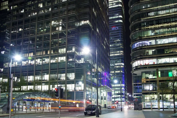 LONDON, CANARY WHARF UK - APRIL 4, 2014  Canary Wharf tube, bus and taxi station in the night, modern station bringing about 100 000 workers to the aria every day