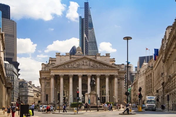 LONDON, UK - JUNE 30, 2014: Busy city of London street, leading to the Bank of England