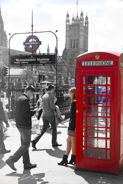 LONDON, UK - MAY 14, 2014: British red telephone box near Westminster tube station, London