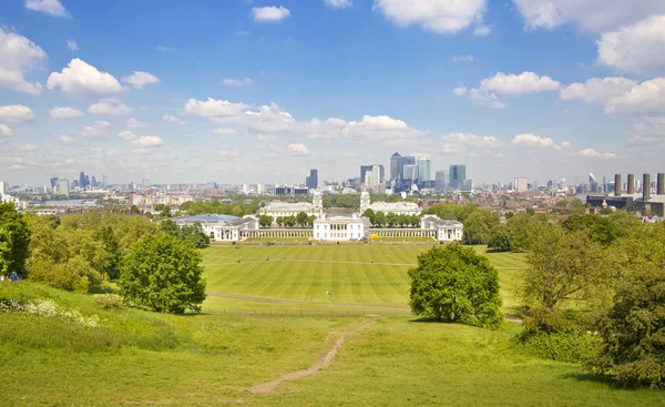 LONDON UK - MAY 15, 2014: View on business district Canary Wharf from old English park Greenwich, south of London