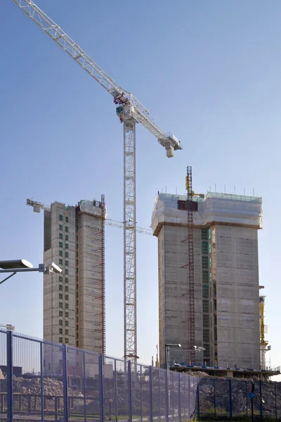 LONDON, UK - MAY 17, 2014: Building site with cranes in centre of London