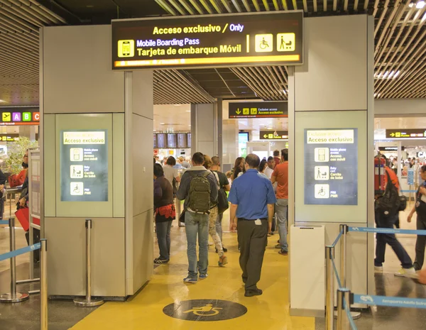 MADRID, SPAIN - MAY 28, 2014: Interior of Madrid airport, queue in departure waiting aria