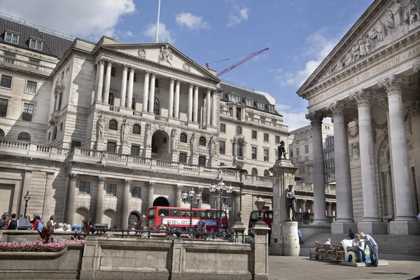 LONDON, UK - JUNE 30, 2014: Busy city of London street, leading to the Bank of England