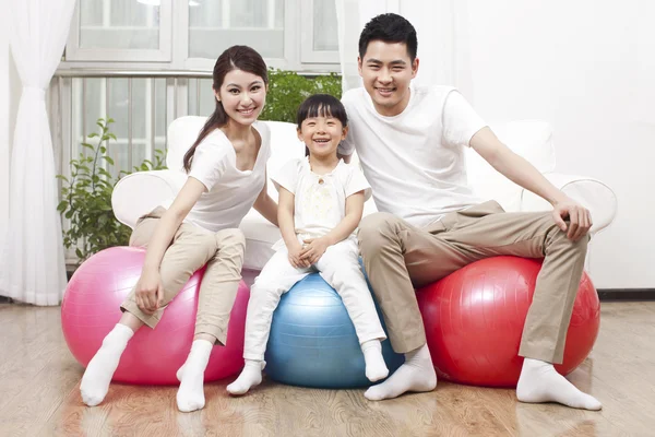 Young family and medicine ball