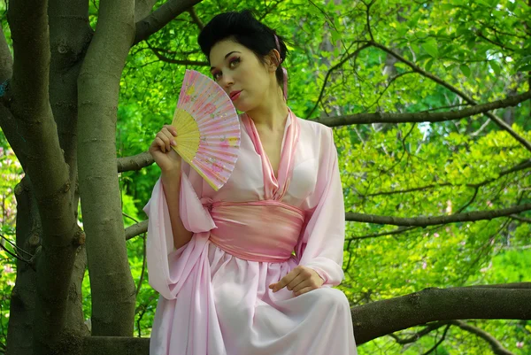 Japanese young woman in spring forest