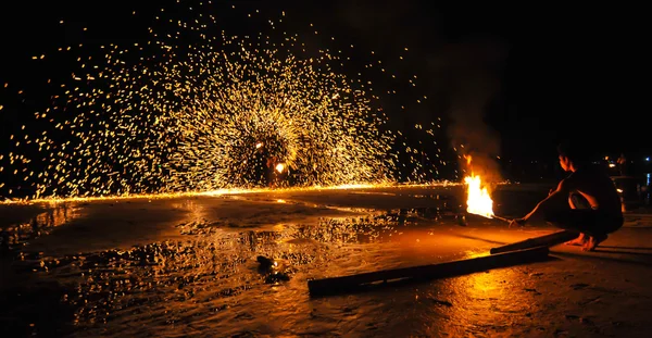 RAYONG,THAILAND-2013 December 21 : Beach show rolling ball of fire