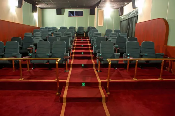 VIP Hall of a cinema and lines of green armchairs