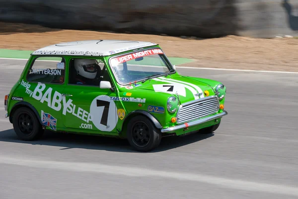 Mini racing around the circuit at Brand\'s Hatch Kent