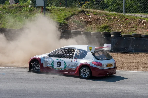 Car spinning off the track at Brand\'s Hatch Kent