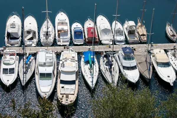 An assortment of boats and yachts in a marina at Monte Carlo