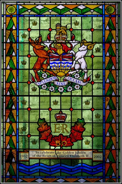 Close-up detail of a stained glass window in the British Colombia Parliament building Victoria