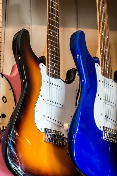 Electric guitars on display in a music shop