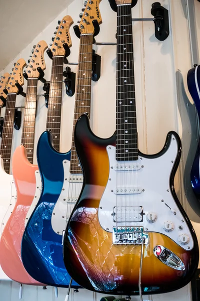 Electric guitars on display in a music shop