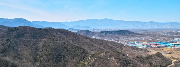 The town and mountains from Beijing Baiwangshan Peak