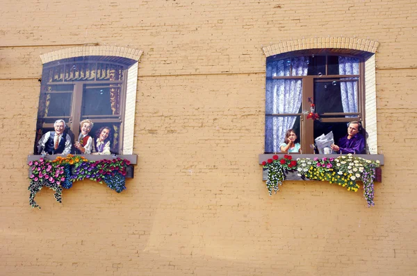 Decorative fake windows with painted people l, capital Victoria,