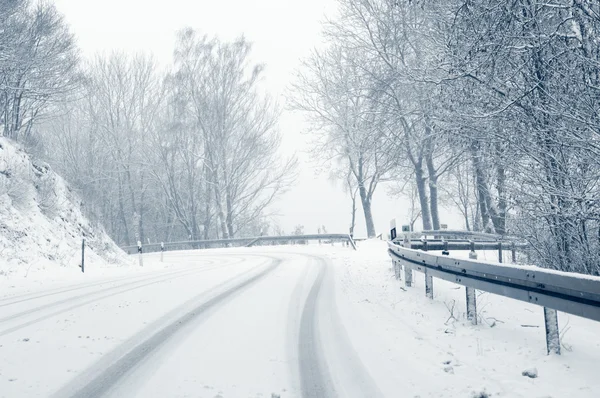 Winter driving - snow on a country road