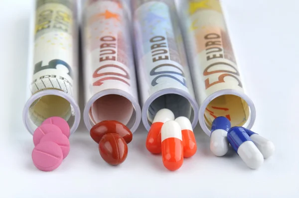 Medical pills in euro banknotes