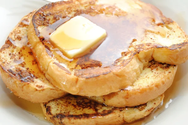 Close-Up of French Toast with Butter and Syrup
