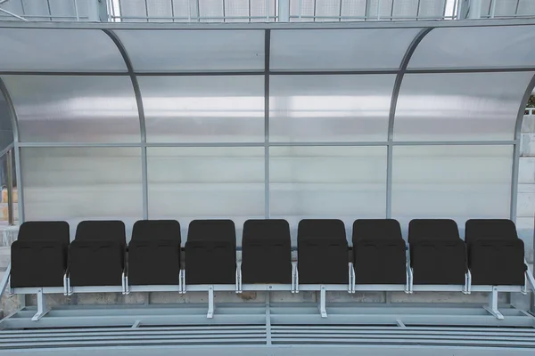 Reserve and staff coach bench in sport stadium