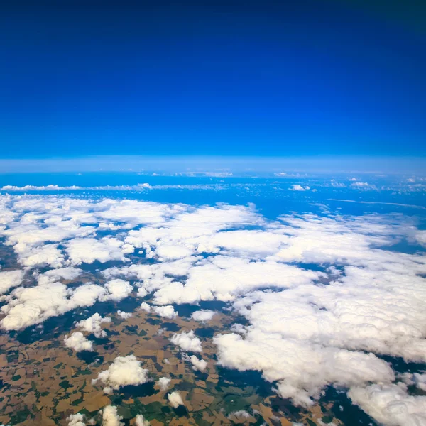 Beautiful cloudy sky view from air plane window