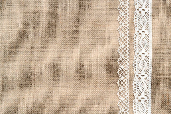 Burlap background with lace