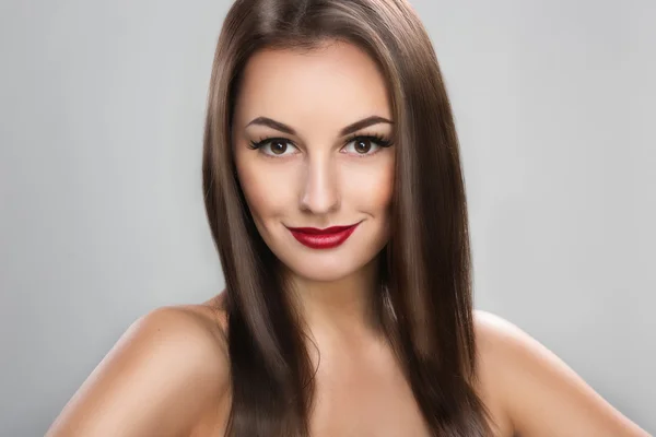 Beautiful woman with long straight brown hair