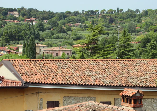 Scenic view over small italian village and hill side