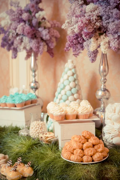 Sweets on the wedding table. Vintage color.
