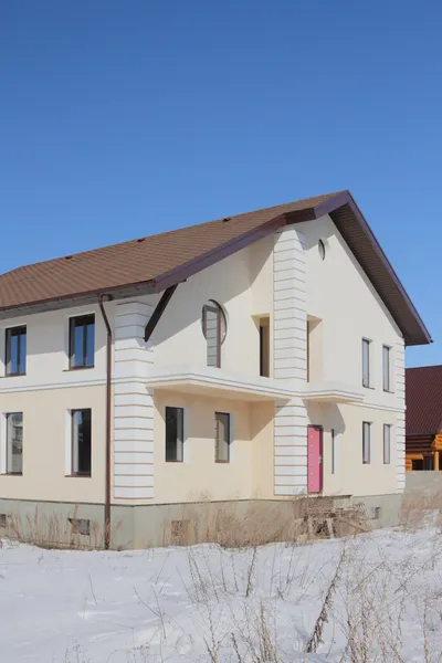 New not populated two-storeyed cottage