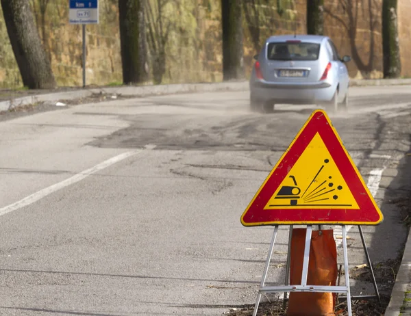 Car on broken road, signal