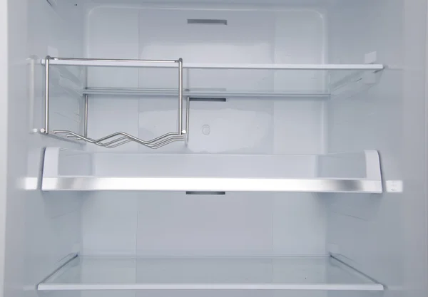 Part of an empty refrigerator