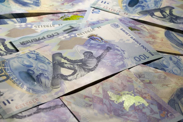 Background. Commemorative banknotes100 rubles to the Olympic games in Sochi