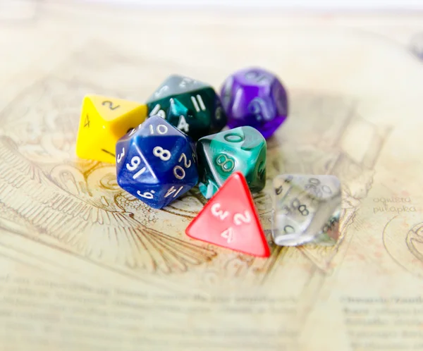Role playing dices lying on picture background