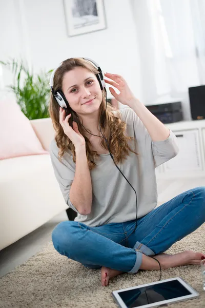 Cheerful teenager relaxed at home