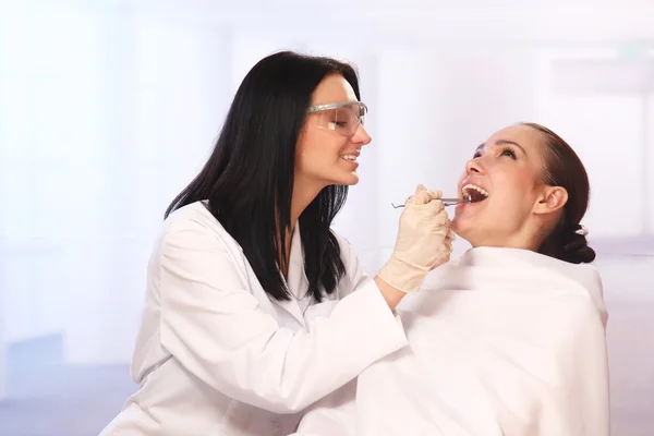 Female patient takes a dental attendance