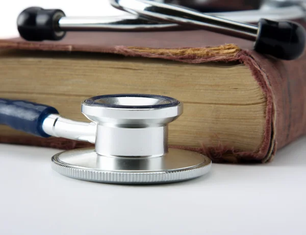 Medical education with book and stethoscope.