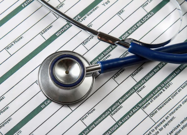 Stethoscope on medical billing statement