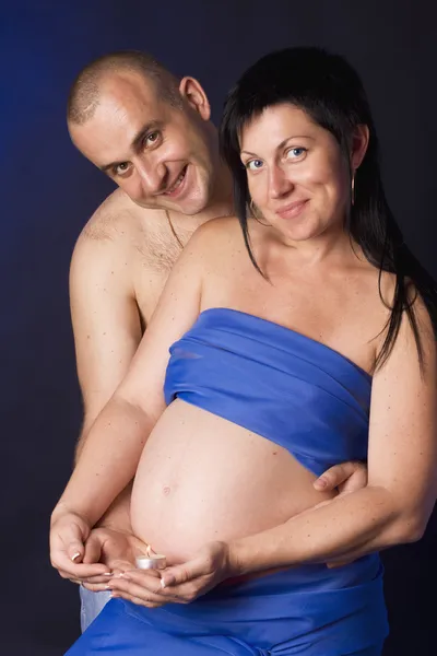Portrait of pregnant woman with spouse