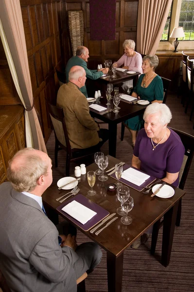 http://st.depositphotos.com/3214361/4190/i/450/depositphotos_41900349-stock-photo-older-couples-in-restaurant.jpg